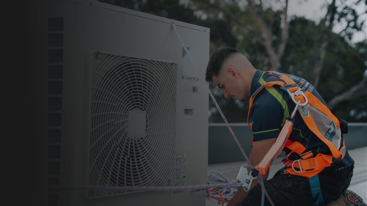 ClimaCool technician installing a split system outdoor unit